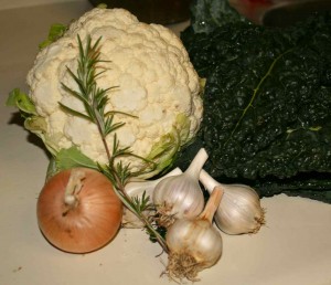 fresh ingredients: kale, garlic, cauliflower, rosemary, and onion