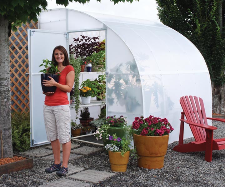 Solexx Harvester Greenhouse Kit attaches to building