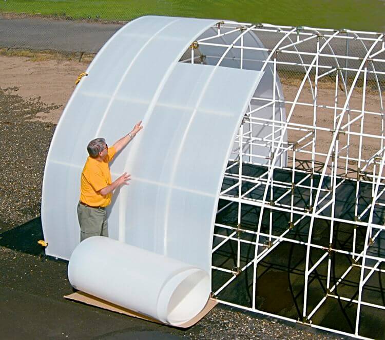 Solexx rolls applied to greenhouse frame