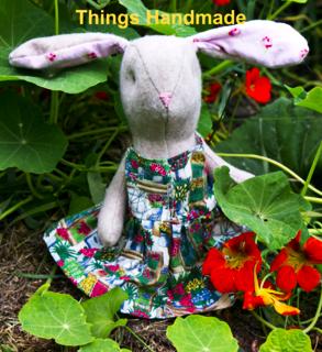 Handmade rabbit in garden dress