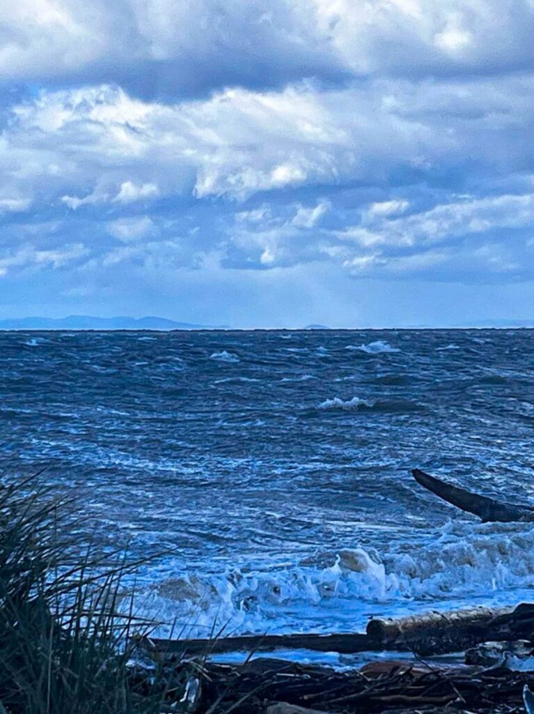King tide, rough sea, and storm clouds